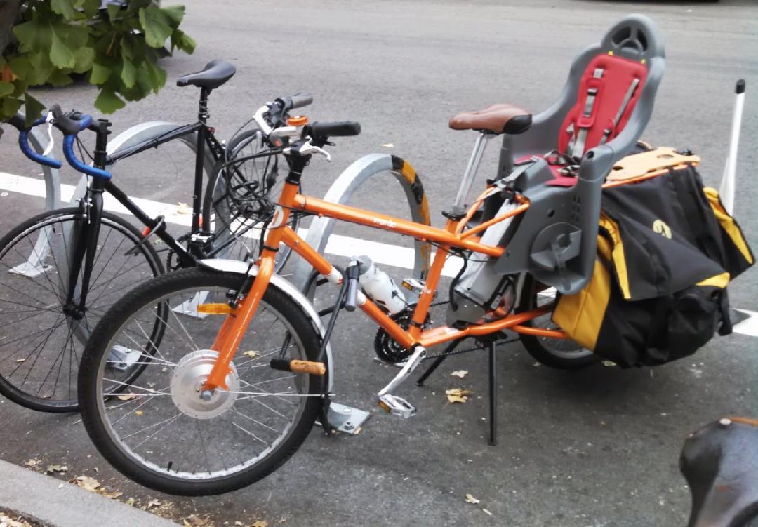 A friend's Yuba el Mundo cargo bike with electrical assist, set up for carrying a kid and large quantities of groceries/cargo. I...