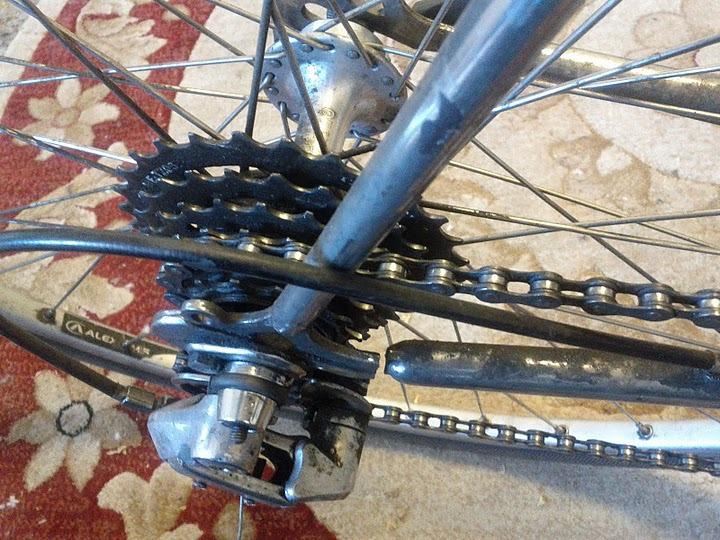 Bad news: On a casual ride home on smooth pavement, I felt the rear wheel (on my old french road bike) skitter like I'd run over...