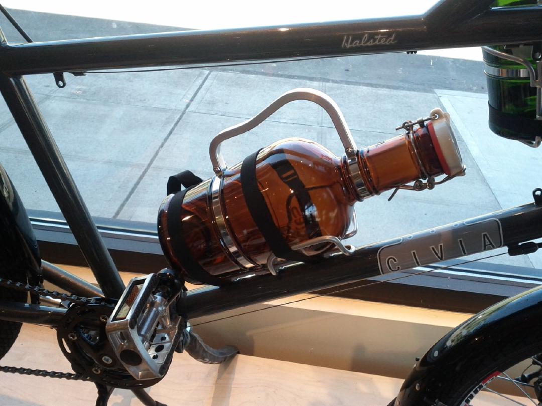 Bike-mounted growler carrier (the need for straps is inelegant) (PDX)