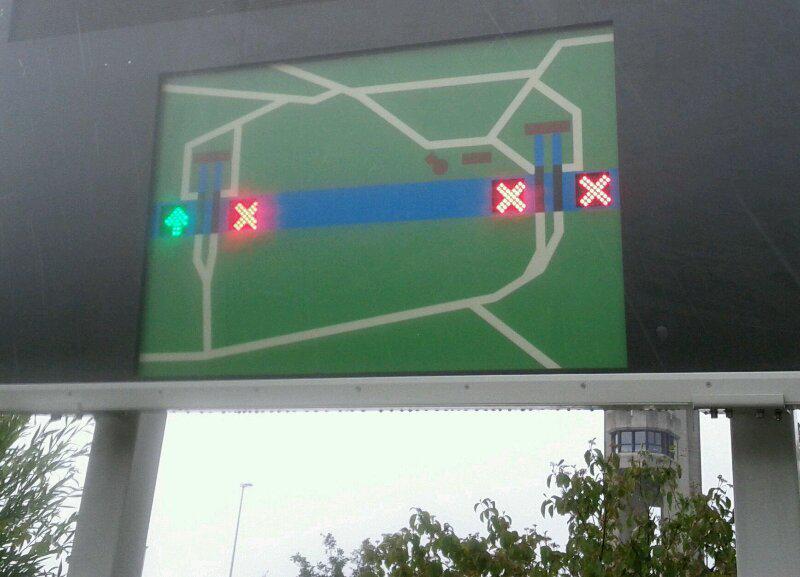 Crossing canals by biking across a set of locks (I've never seen locks in action before). This board shows which locks are...
