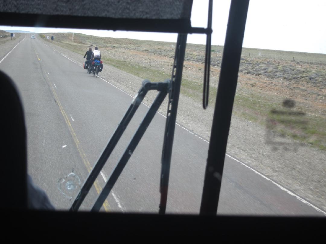 People seen cycle touring along Route 40 in Patagonia, far from civilization